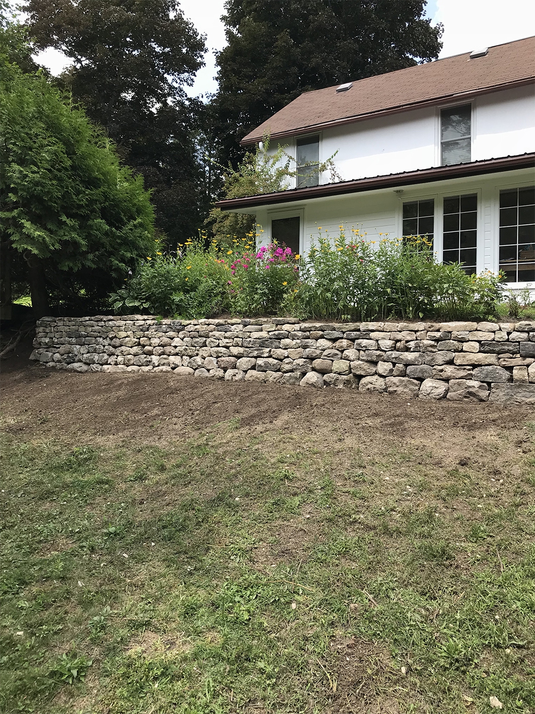 field stone wall restoration rebuild retaining